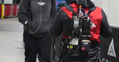 Pittsburgh Steelers quarterback Aaron Rodgers arrives before Monday's wild-card game