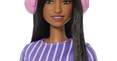 The first-ever autistic Barbie doll (pictured) has been released - featuring a fidget spinner, noise-cancelling headphones and a shifted eye gaze - but some have argued it is guilty of 'reinforcing stereotypes'