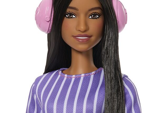 The first-ever autistic Barbie doll (pictured) has been released - featuring a fidget spinner, noise-cancelling headphones and a shifted eye gaze - but some have argued it is guilty of 'reinforcing stereotypes'