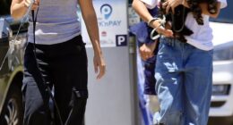 Bec Hewitt looked in good spirits as she stepped out for a stroll on Bondi Beach with her daughter Ava on Monday. Both pictured
