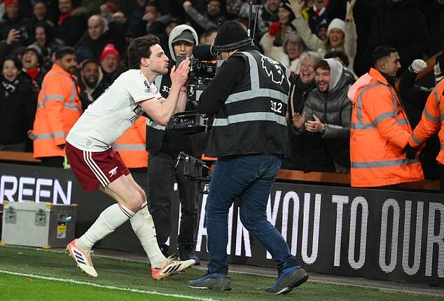 Declan Rice raced over to the Arsenal fans tucked away into the corner, grabbed the television camera in both hands, and planted a smacker right on the lens