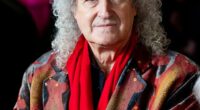 Queen will never perform at Worthy Farm due to the band's political differences with the organisers, the Eavis family, Sir Brian Mayhas said
