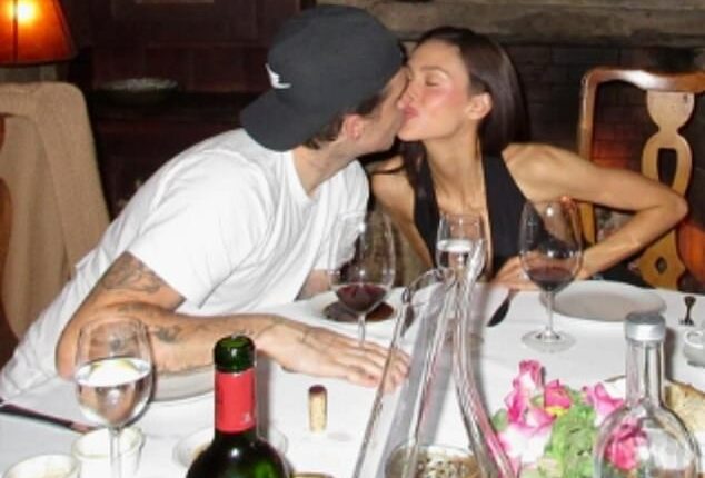 The fallout appeared to be forgotten on Tuesday as Brooklyn Beckham enjoyed more of the 'peace and relief' he's found since cutting ties with his family - this time over a glass of the world's most expensive wine