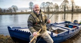 Clarke is clearly enjoying the opening day of the salmon fishing season on the River Tay