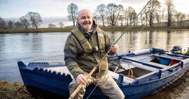 Clarke is clearly enjoying the opening day of the salmon fishing season on the River Tay