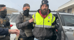 William Kelly being arrested