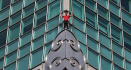 Daredevil Alex Honnold cheats death by scaling 101-story Taiwan tower without ropes in nerve-shredding Netflix challenge