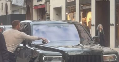 David Beckham ripped a parking ticket off the windscreen of his swanky Rolls Royce after a shopping spree at Rolex on Bond Street with wife Victoria on Sunday