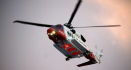HM Coastguard deployed a helicopter to the scene following reports of people getting into difficulty in the water