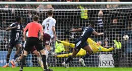 Substitute Craig Gordon pulls off his stunning stoppage-time save to earn Hearts a vital win