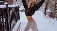 Emily Ratajkowski braved the freezing temperatures and blizzard in a cropped sweatshirt