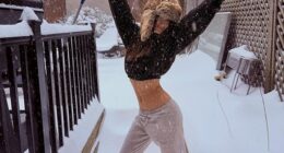 Emily Ratajkowski braved the freezing temperatures and blizzard in a cropped sweatshirt