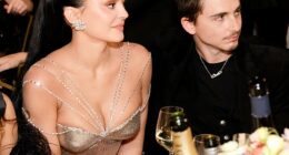 As they took their seats with fellow celebrity guests before the ceremony got underway, snatched footage reveals a seemingly fierce exchange between Kylie Jenner and Timothee- no matter how much they tried to mask their tense words behind smiles.