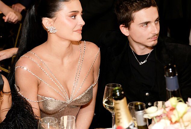 As they took their seats with fellow celebrity guests before the ceremony got underway, snatched footage reveals a seemingly fierce exchange between Kylie Jenner and Timothee- no matter how much they tried to mask their tense words behind smiles.