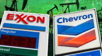 Exxon, Chevron are producing oil at record rates, but lower prices led to lower earnings