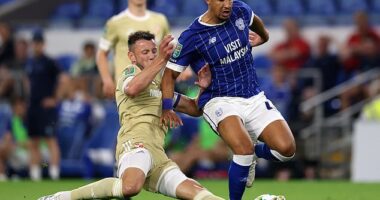Swindon Town footballer, Ollie Clarke (left), pictured in the game against Cardiff in which the incidents took place last August. There is no suggestion Cardiff player Callum Robinson (right) was one of the opponents affected by Clarke's behaviour