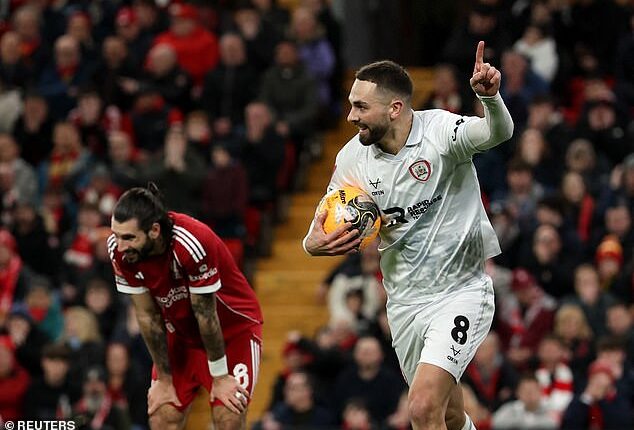 Dominik Szobozlai (left) gifted Barnsley a goal in Liverpool's FA Cup clash against the League One side