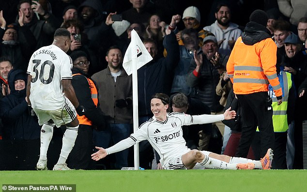 Harry Wilson celebrates his stoppage-time free-kick that won the game for Fulham