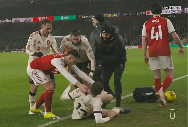Fuming Gary Neville rips into 'idiot' Gabriel Martinelli as Arsenal star tries to push injured Conor Bradley off pitch: 'I don't know how Liverpool players didn't whack him' - with Roy Keane likening it to Alf-Inge Haaland bust-up