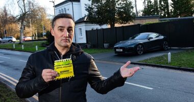 David Miller stood outside his home beside where his car was parked when he received the ticket