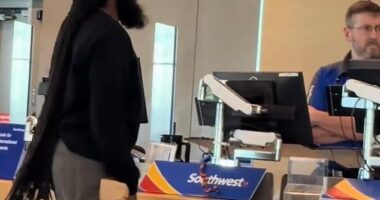 An irate passenger was caught on camera threatening a Southwest employee at Kansas City International Airport on Monday