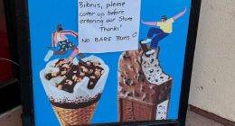 A cafe has raised eyebrows with a handwritten sign singling out women over a dress code rule