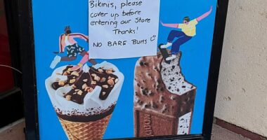 A cafe has raised eyebrows with a handwritten sign singling out women over a dress code rule