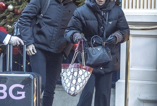 Giovanni Pernice and girlfriend Bianca Guaccero keft The Ritz London hotel on Saturday after ringing in the New Year together