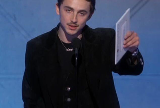 Timothee Chalamet barely acknowledged girlfriend Kylie Jenner while earning a top honor for Marty Supreme at the Golden Globe Awards 2026.