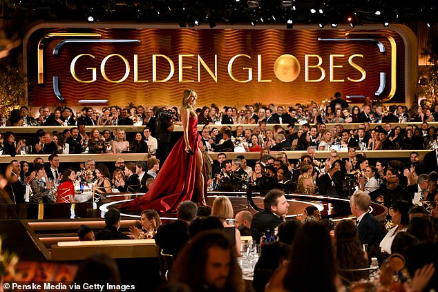 The Golden Globes has come under fierce fire online after it announced one of the main awards during a commercial break. Host Nikki Glaser is seen on stage during the event