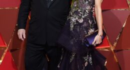 Harvey Weinstein and his then-wife Georgina Chapman pose at the 2018 Oscars