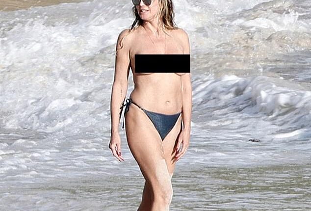 Heidi Klum, 52, enjoyed another topless outing at the beach in St. Barts on Monday