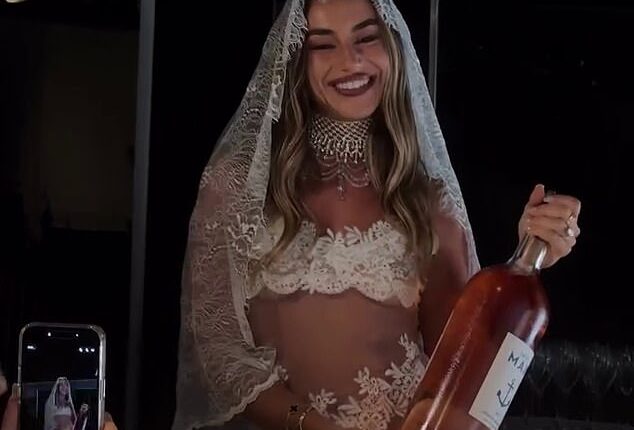 Sydney socialite Tayla Cohen has stunned fans by wearing a barely-there 'nude' lace mini-dress to her wild hen's party