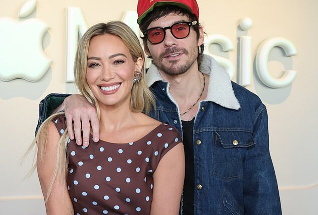 Hilary Duff's, 38, husband Matthew Koma, 38, has weighed in on the recent 'Toxic Mom Group' drama while roasting Ashley Tisdale, 40; Duff and Koma seen in 2025