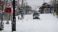 Winter Storm Fern hit parts of the South, Midwest, and Great Plains on Saturday afternoon. Pictured above is an empty street covered in snow in Little Rock, Arkansas