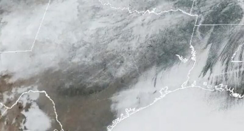 Historic winter storm continues to batter East Coast with 4in snow as crippling ice is seen from SPACE: Live updates