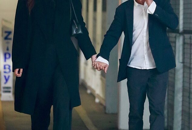 Sean Penn and his girlfriend, Valeria Nicov, were seen holding hands in a rare public display of affection, just days after he sparked controversy for smoking during the Golden Globe Awards