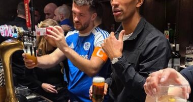 Macclesfield FC captain Paul Dawson (left), pictured still in his kit and pulling pints after his side's famous win over Crystal Palace, was shovelling snow last Tuesday night