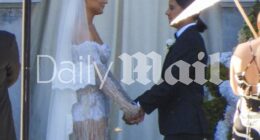 Sam Kerr and Kristie Mewis (pictured right and left) tied the knot in a stunning ceremony on New Year's Eve