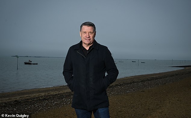Tony Cottee, pictured on Southend seafront, is still a West Ham season-ticket holder