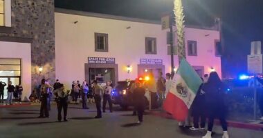 A large crowd of anti-ICE protestors surrounded a restaurant in Lakewood, a city in Los Angeles, on Wednesday night after hearing there were apparently federal agents dining inside