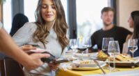 I’m 28 and earn $120K. My ‘very poor’ friends assumed I was picking up the dinner tab. Should I ask them to pay me back?