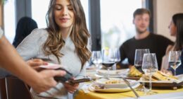 I’m 28 and earn $120K. My ‘very poor’ friends assumed I was picking up the dinner tab. Should I ask them to pay me back?