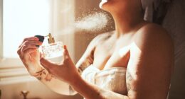 A spritz of perfume on the neck seems like a normal way to apply it - but health experts have warned that it may have some serious side effects (stock image)