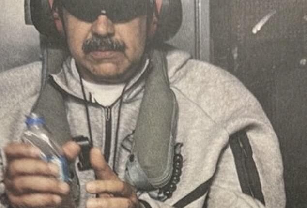 This image posted on US President Donald Trump's Truth Social account on January 3, 2026, shows Venezuela's President Nicolas Maduro onboard the USS Iwo Jima after the US military captured him on January 3, 2026.