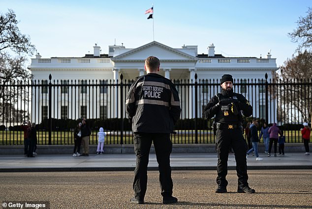 Officers from the Secret Service's Uniformed Division patrol Pennsylvania Ave. in front of the White House. The Secret Service wants to recruit around 2,000 more people to this division ahead of 2028
