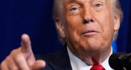 Iran warns Trump not to cross ‘red line’ after US president says military ‘locked and loaded’ to help protesters