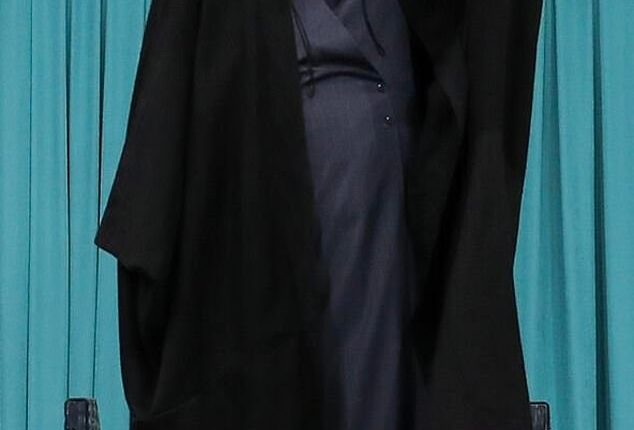 Pictured: Iranian Supreme Leader Ali Khamenei waves during a meeting in Tehran today