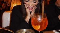 A woman poses up a storm as she enjoys an Italian dinner at one of the Big Mamma restaurants in London
