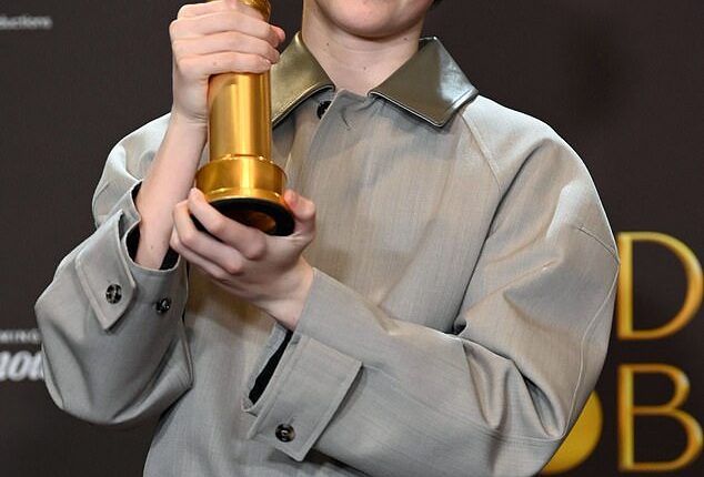 Owen Cooper raises his Golden Globe for his performance in Adolescence last weekend
